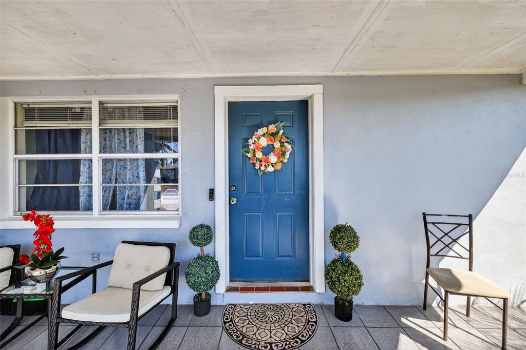 3837 Darlington Road Holiday, FL 34691 - Photo 3 of 28 a dining room with furniture and a potted plant