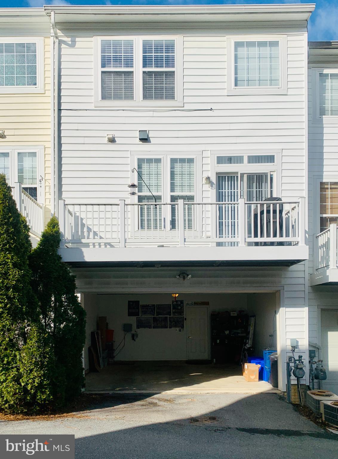 9823 Darcy Forest Drive Silver Spring, MD 20910 - Photo 27 of 32 a front view of a house with a garage