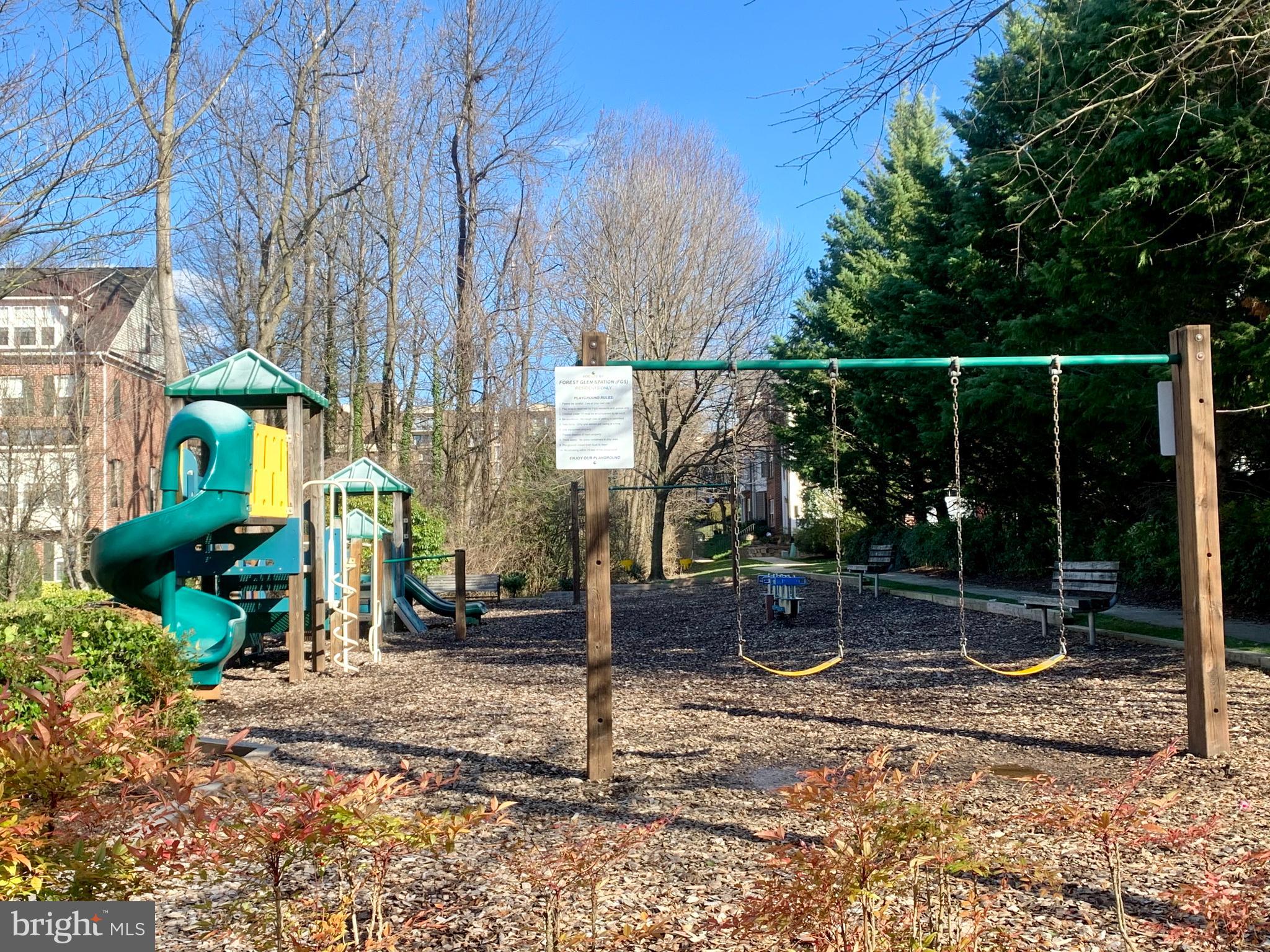 9823 Darcy Forest Drive Silver Spring, MD 20910 - Photo 29 of 32 a backyard of a house with lots of green space