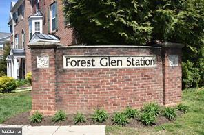 9823 Darcy Forest Drive Silver Spring, MD 20910 - Photo 30 of 32 a sign on the side of a building