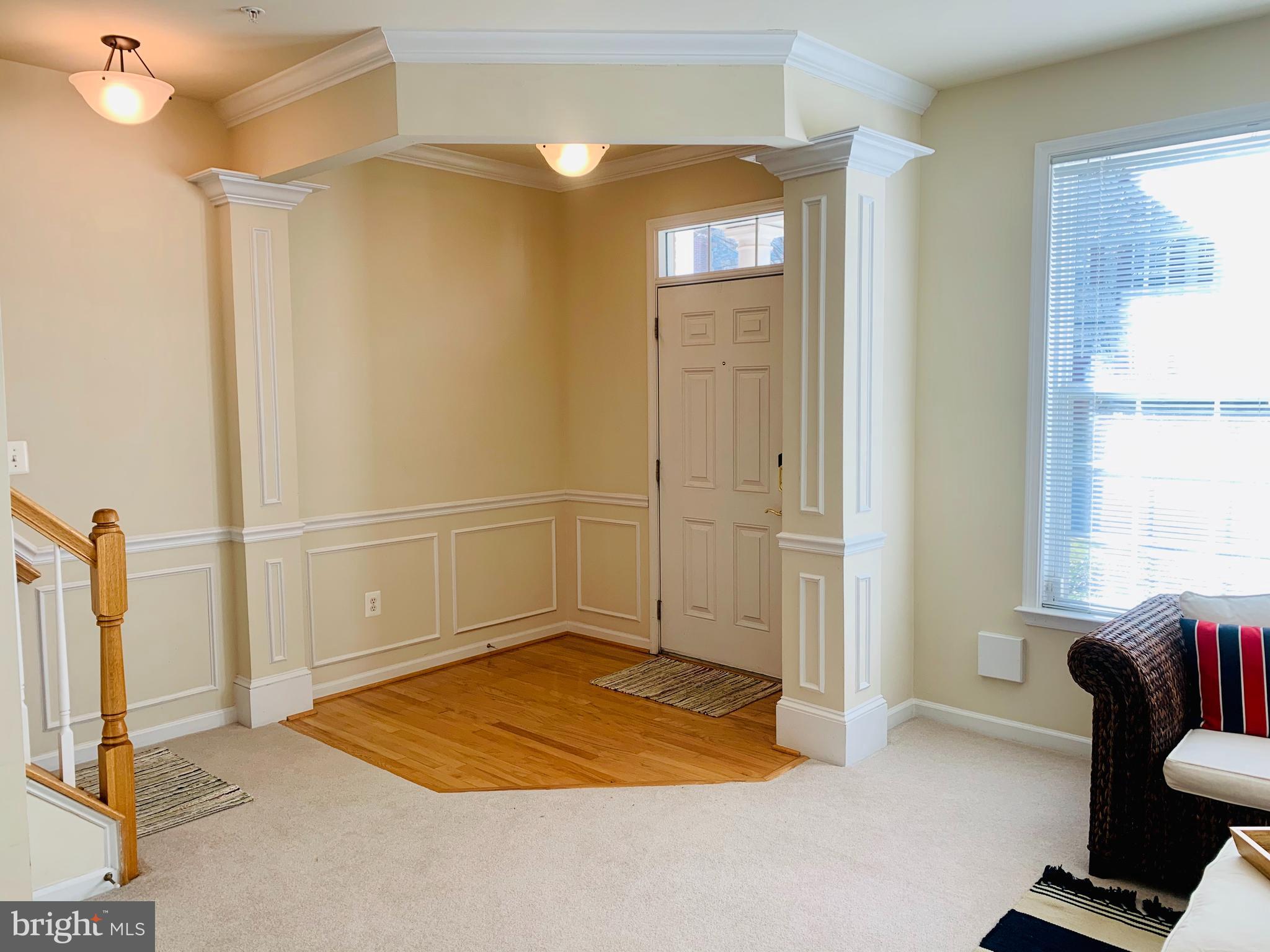 9823 Darcy Forest Drive Silver Spring, MD 20910 - Photo 4 of 32 a view of livingroom with hardwood floor and window