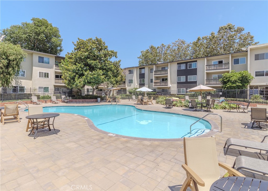 12200 Montecito Road, Unit D320 Seal Beach, CA 90740 - Photo 26 of 27 a view of a swimming pool with chairs
