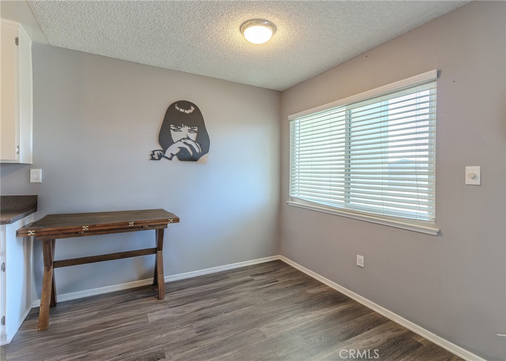 12200 Montecito Road, Unit D320 Seal Beach, CA 90740 - Photo 3 of 27 a room with a window and a workspace