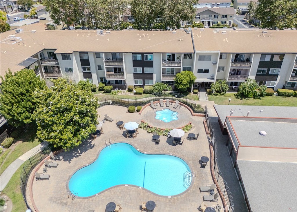 12200 Montecito Road, Unit D320 Seal Beach, CA 90740 - Photo 9 of 27 a view of a swimming pool with outdoor seating