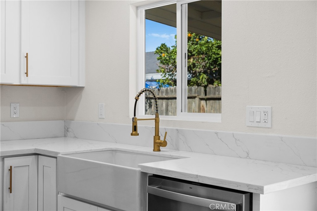 7931 Silverado Place Riverside, CA 92503 - Photo 17 of 35 a kitchen with a sink and a window
