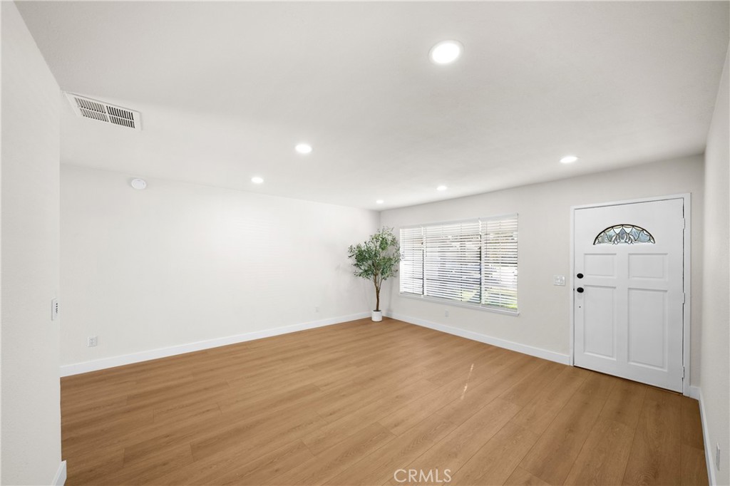 7931 Silverado Place Riverside, CA 92503 - Photo 8 of 35 a view of an empty room with a window