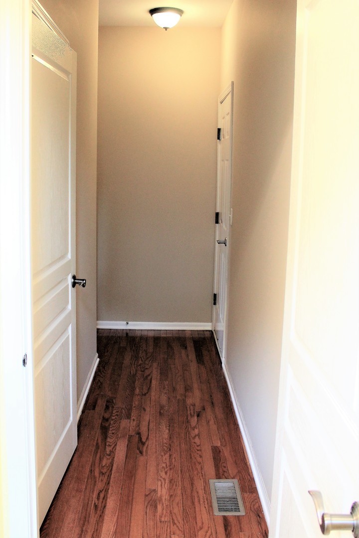 1546 Clear Drive Bolingbrook, IL 60490 - Photo 8 of 30 a view of a small space with wooden floor and staircase