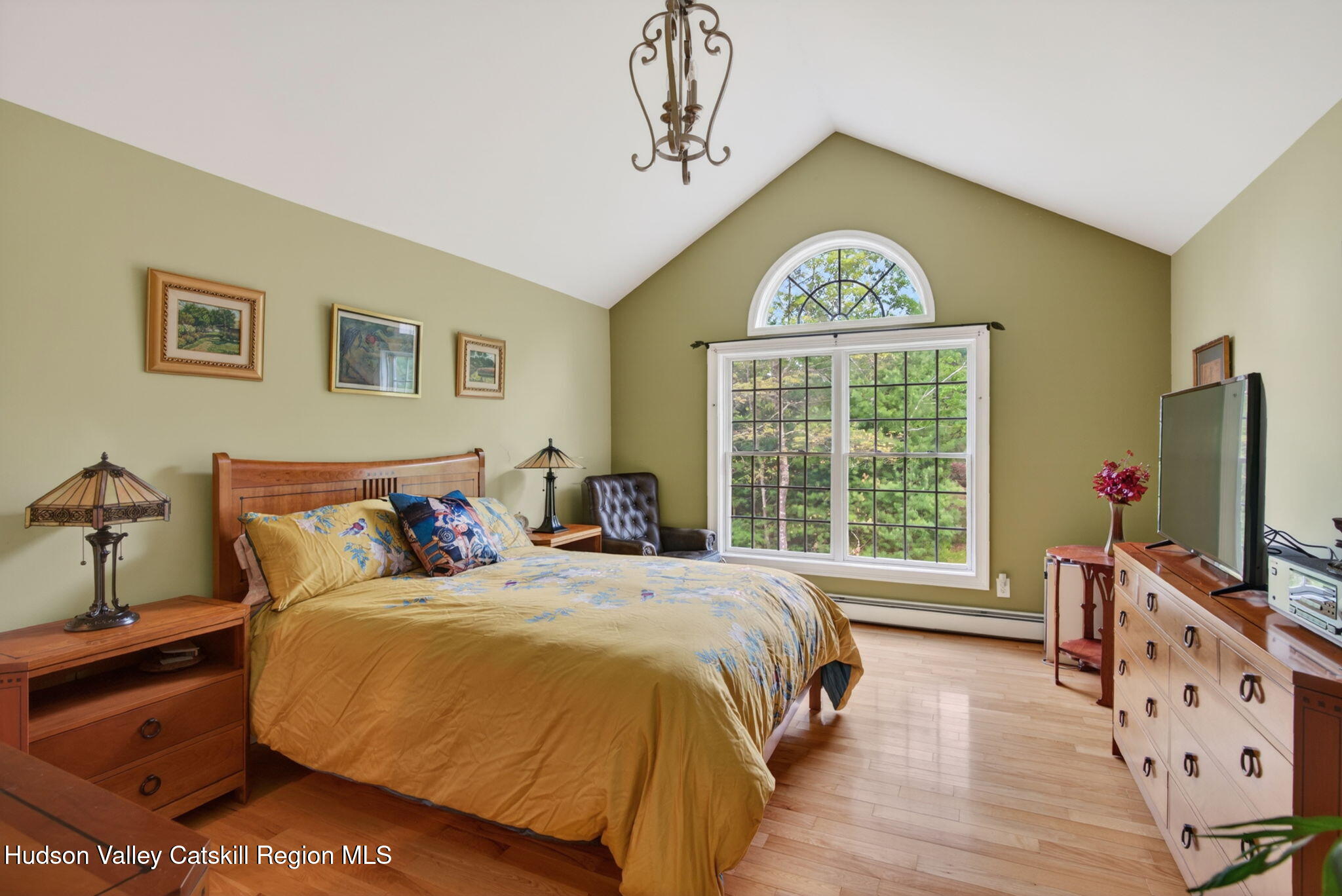 189 Bush Road Stone Ridge, NY 12484 - Photo 21 of 60 a bed room with a bed tv and a large window