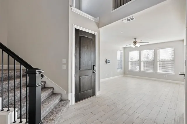a view of an entryway with staircase