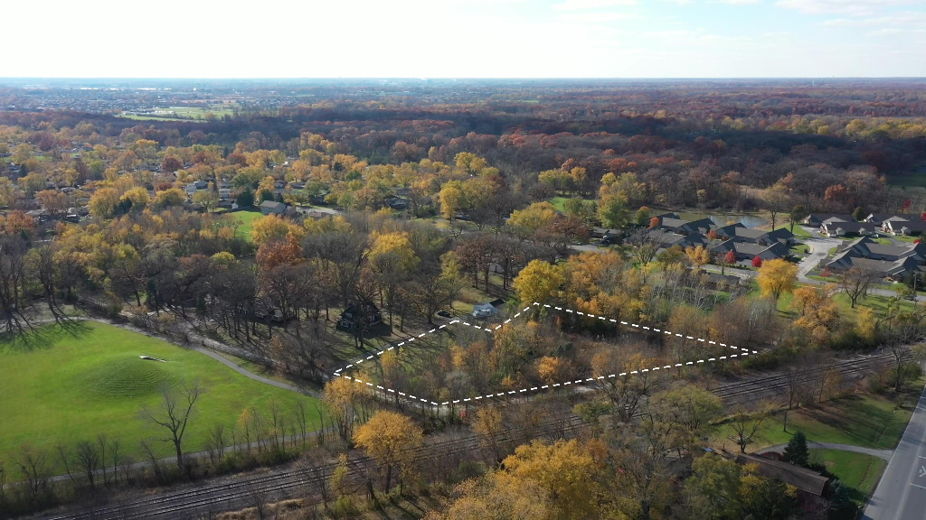 18602 Chicago Avenue Lansing, IL 60438 - Photo 4 of 22 an aerial view of residential house with outdoor space and river