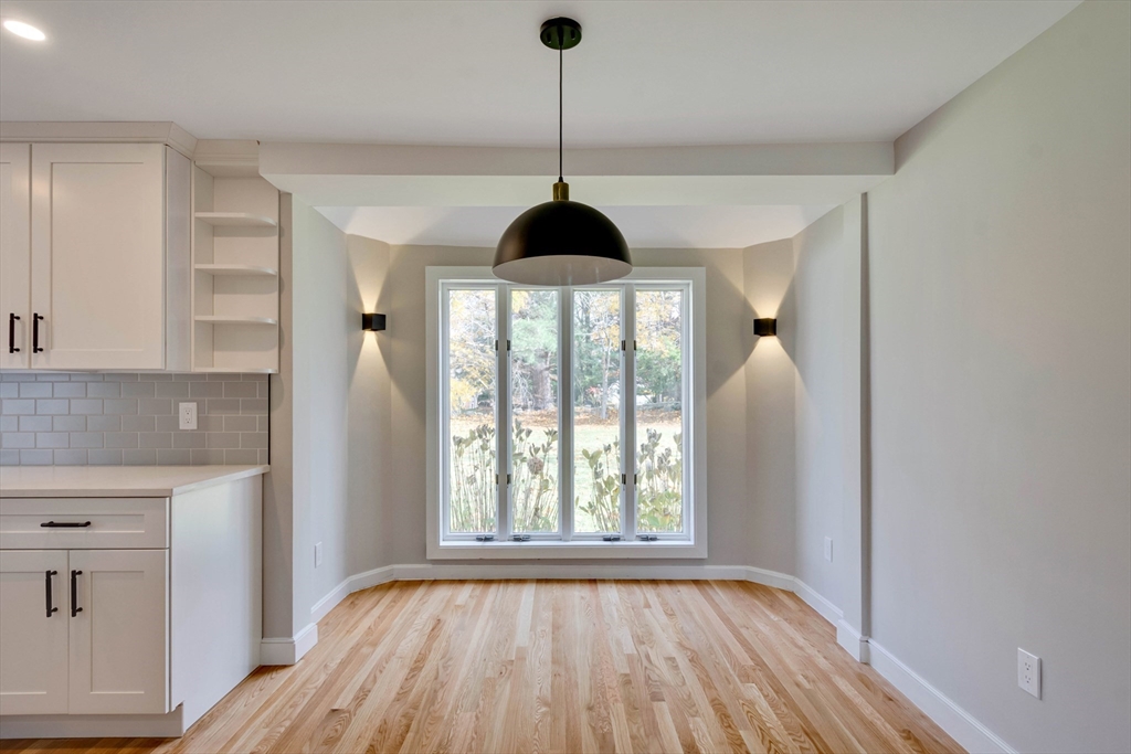 34 Irving Drive Walpole, MA 02081 - Photo 12 of 42 a room with window and wooden floor