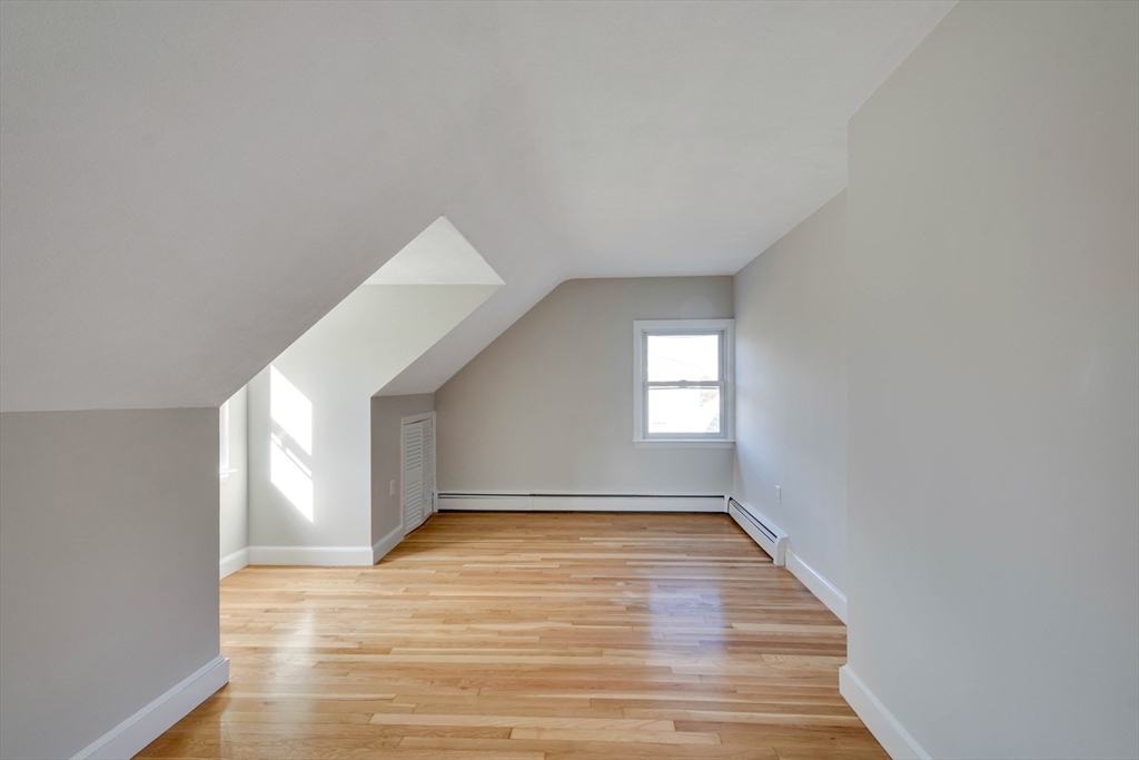 34 Irving Drive Walpole, MA 02081 - Photo 29 of 42 a view of an empty room and window