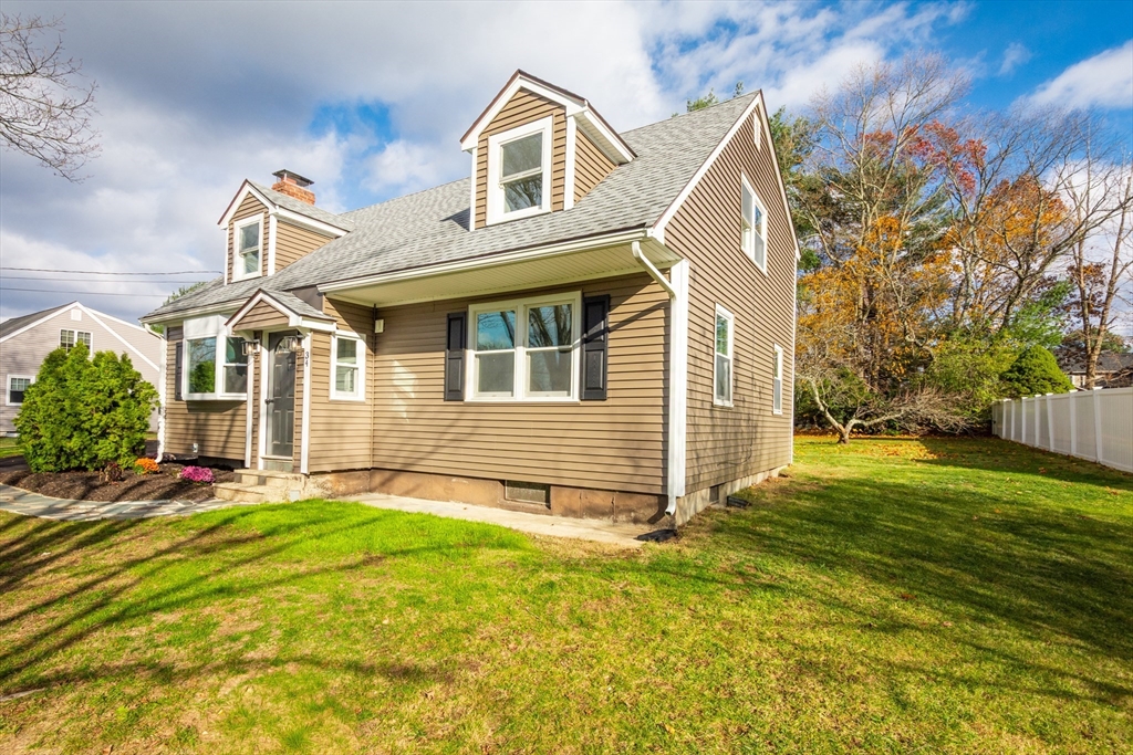 34 Irving Drive Walpole, MA 02081 - Photo 38 of 42 a front view of a house with a yard