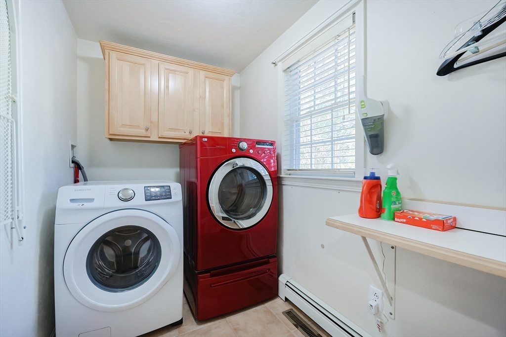52 Quail Creek Road North Attleboro, MA 02760 - Photo 18 of 42 a utility room with dryer and washer
