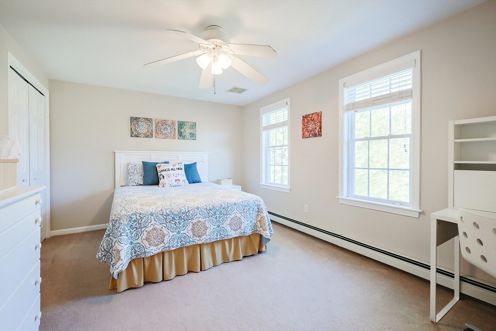 52 Quail Creek Road North Attleboro, MA 02760 - Photo 20 of 42 a bedroom with a bed and a window