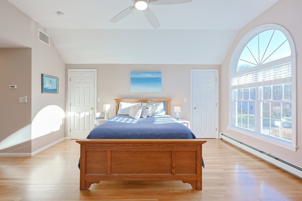 52 Quail Creek Road North Attleboro, MA 02760 - Photo 31 of 42 a bedroom with a bed and a large window