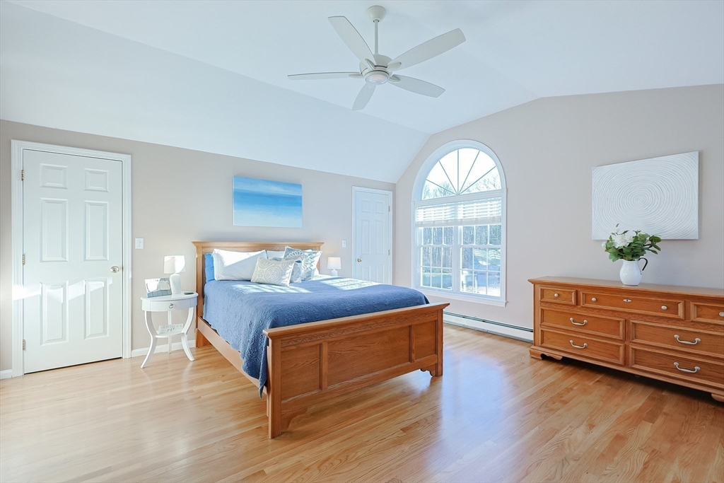 52 Quail Creek Road North Attleboro, MA 02760 - Photo 33 of 42 a spacious bedroom with a bed and a window