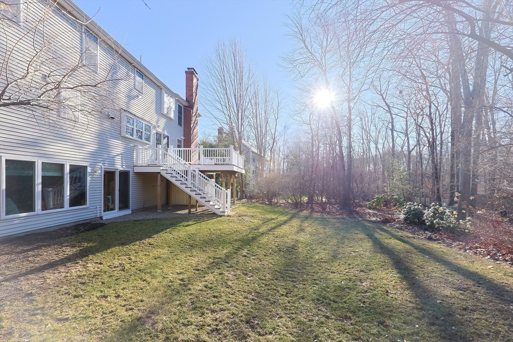52 Quail Creek Road North Attleboro, MA 02760 - Photo 40 of 42 a view of a house with a yard