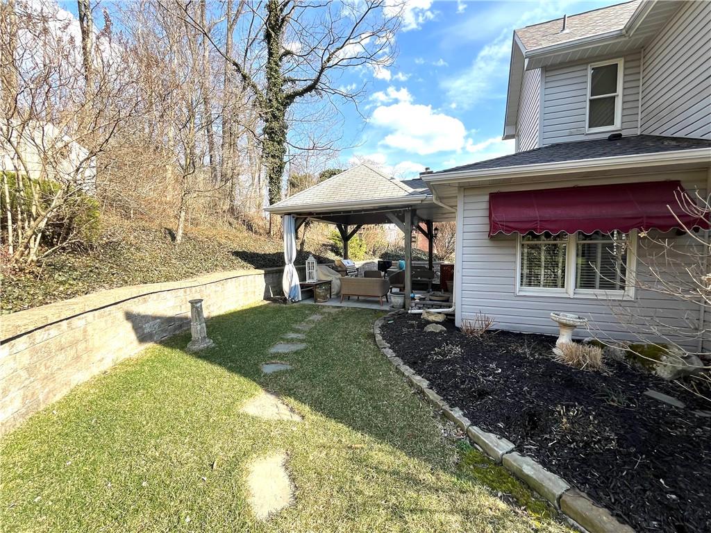 531 Cedar Glenn Drive Irwin, PA 15642 - Photo 11 of 50 a view of a table and chairs in patio