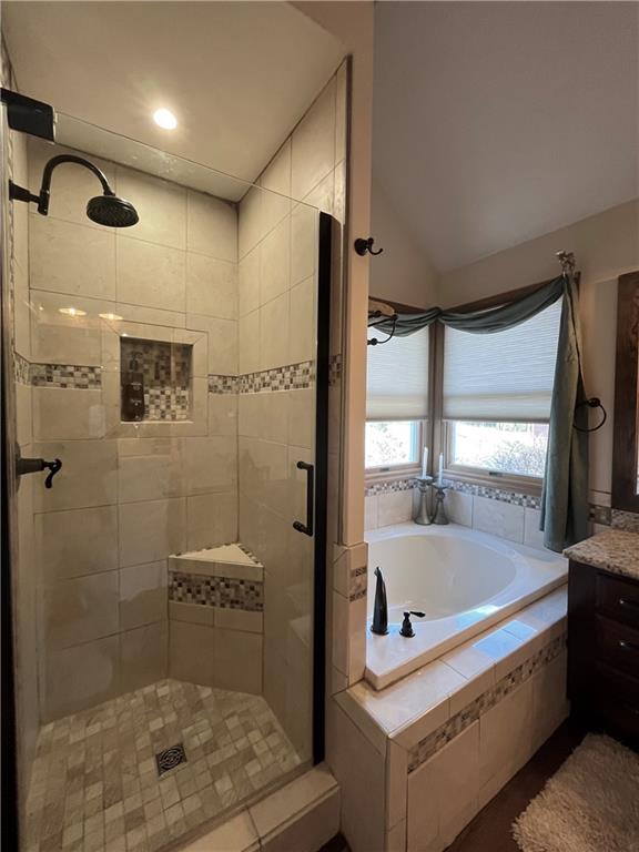 531 Cedar Glenn Drive Irwin, PA 15642 - Photo 33 of 50 a bathroom with a tub a sink and a shower