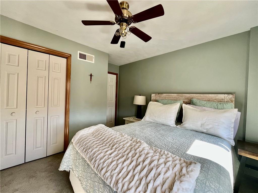 531 Cedar Glenn Drive Irwin, PA 15642 - Photo 35 of 50 a bedroom with a bed and a ceiling fan