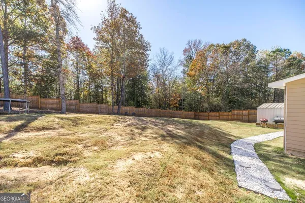 a view of yard with trees