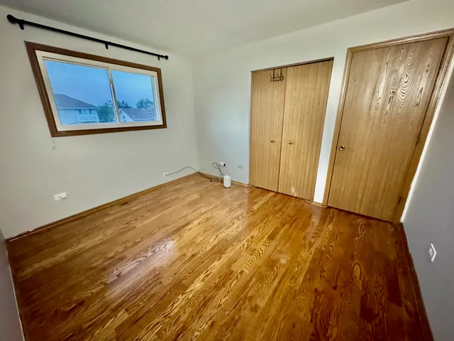 a workspace with furniture and a window