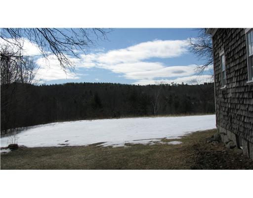 8 Moulton Ridge Road Porter, ME 04068 - Photo 7 of 20 Land/Lot. Snow covered field viewed...