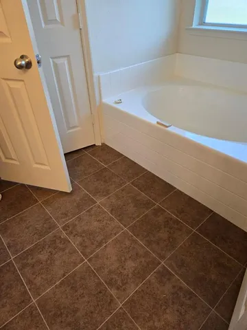 a bathroom with a bathtub