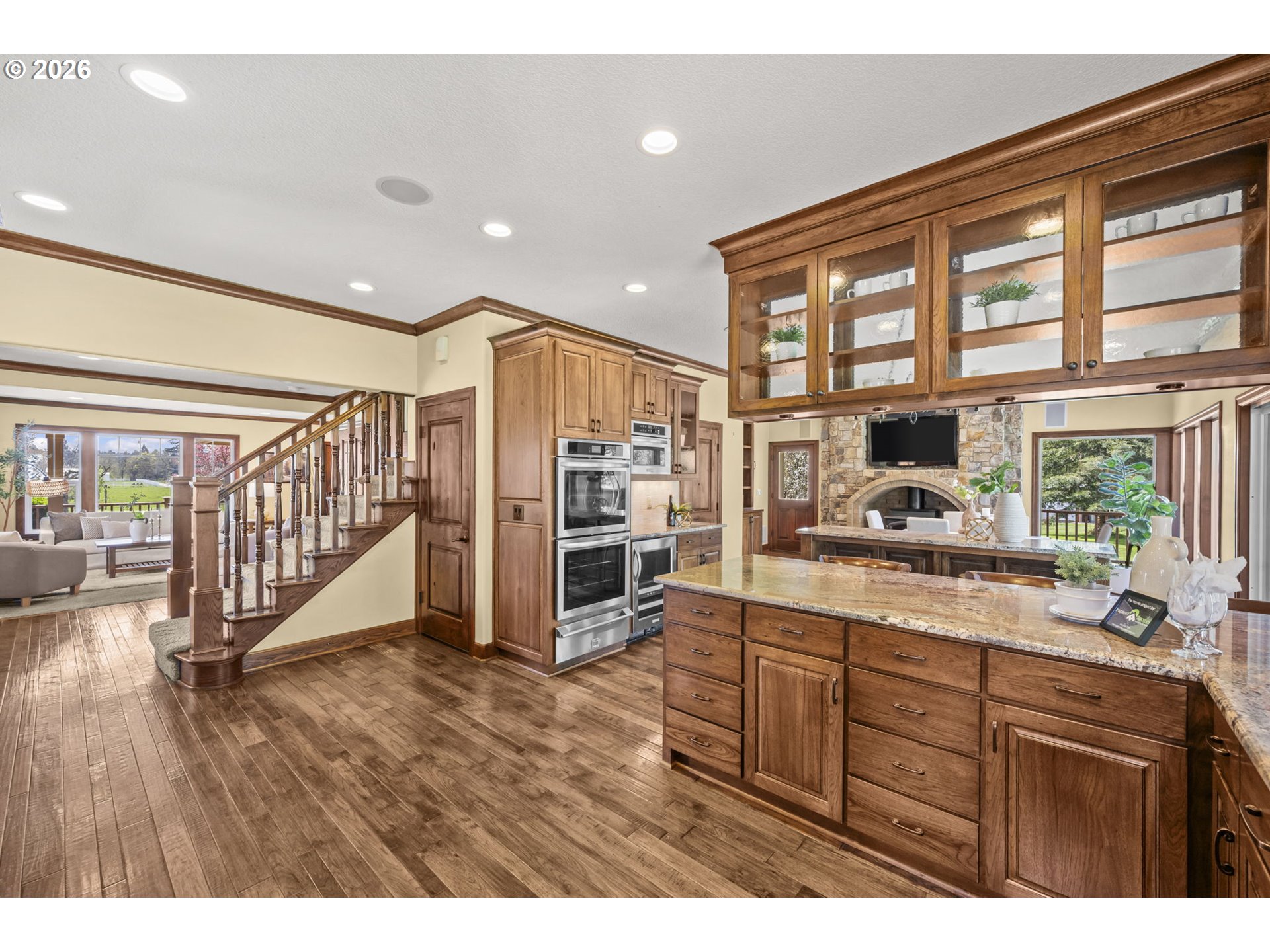 8121 South Vale Garden Road Canby, OR 97013 - Photo 13 of 48 a kitchen with stainless steel appliances granite countertop a refrigerator and a sink