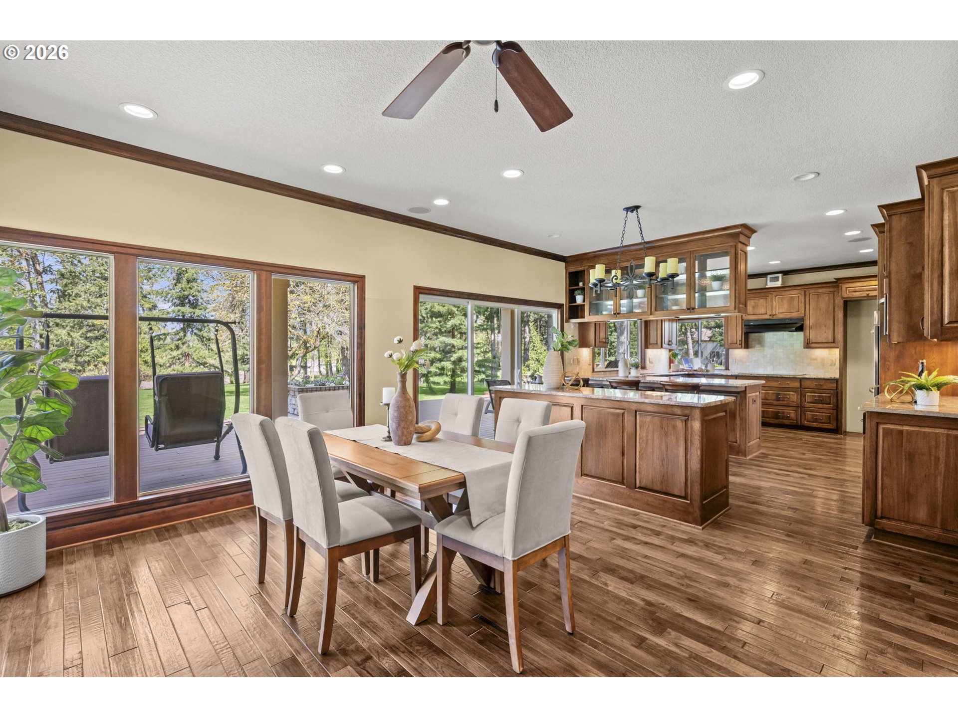 8121 South Vale Garden Road Canby, OR 97013 - Photo 16 of 48 a dining room with furniture and wooden floor