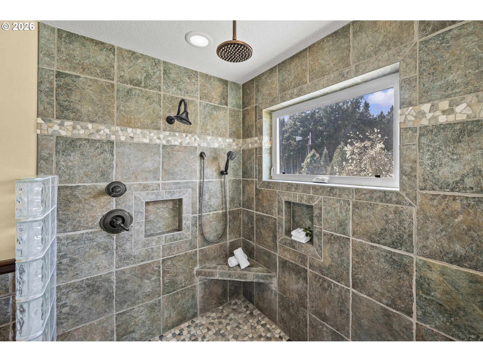 8121 South Vale Garden Road Canby, OR 97013 - Photo 29 of 48 a bathroom with a toilet and a shower