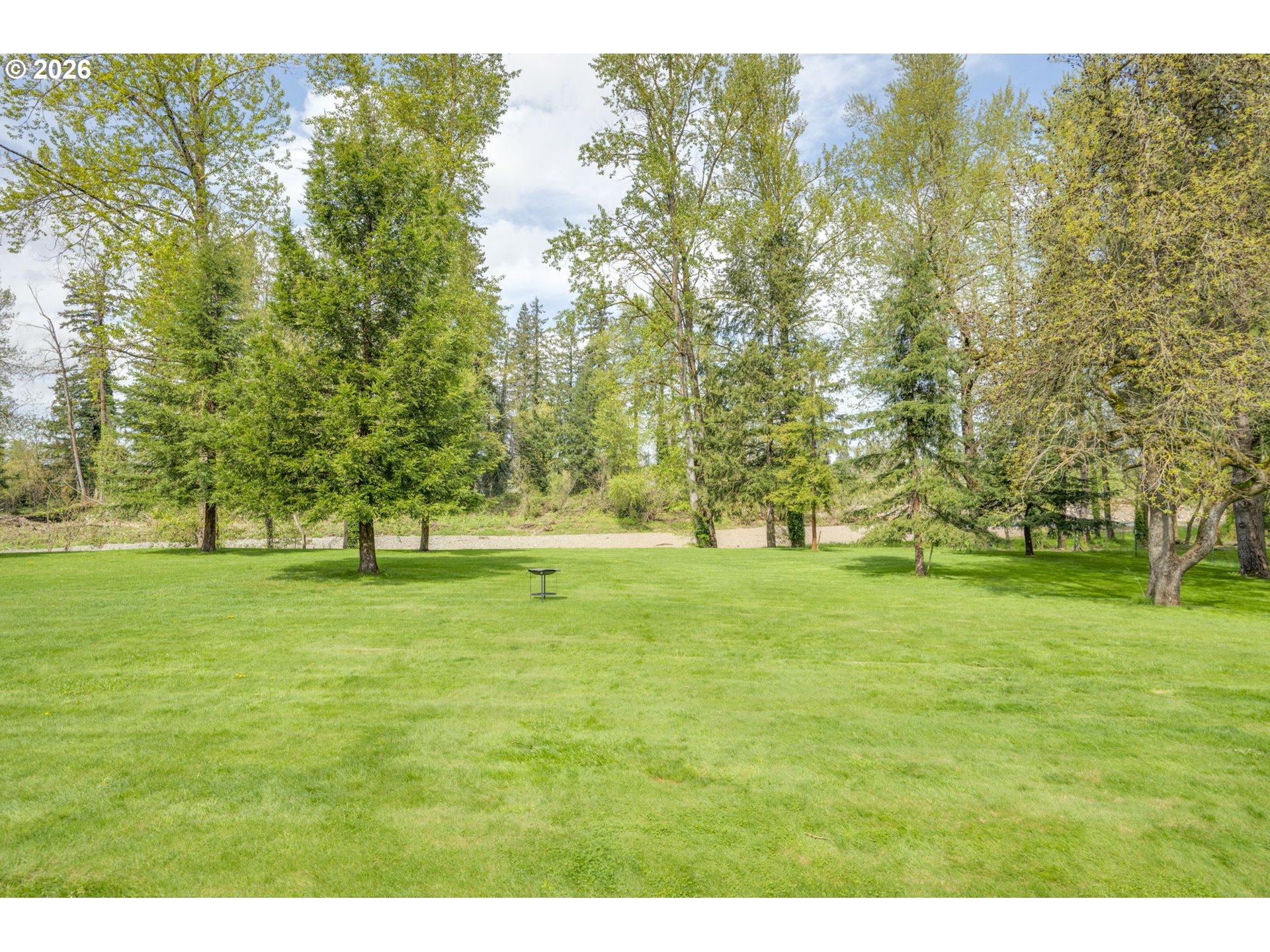 8121 South Vale Garden Road Canby, OR 97013 - Photo 38 of 48 a big yard with lots of trees