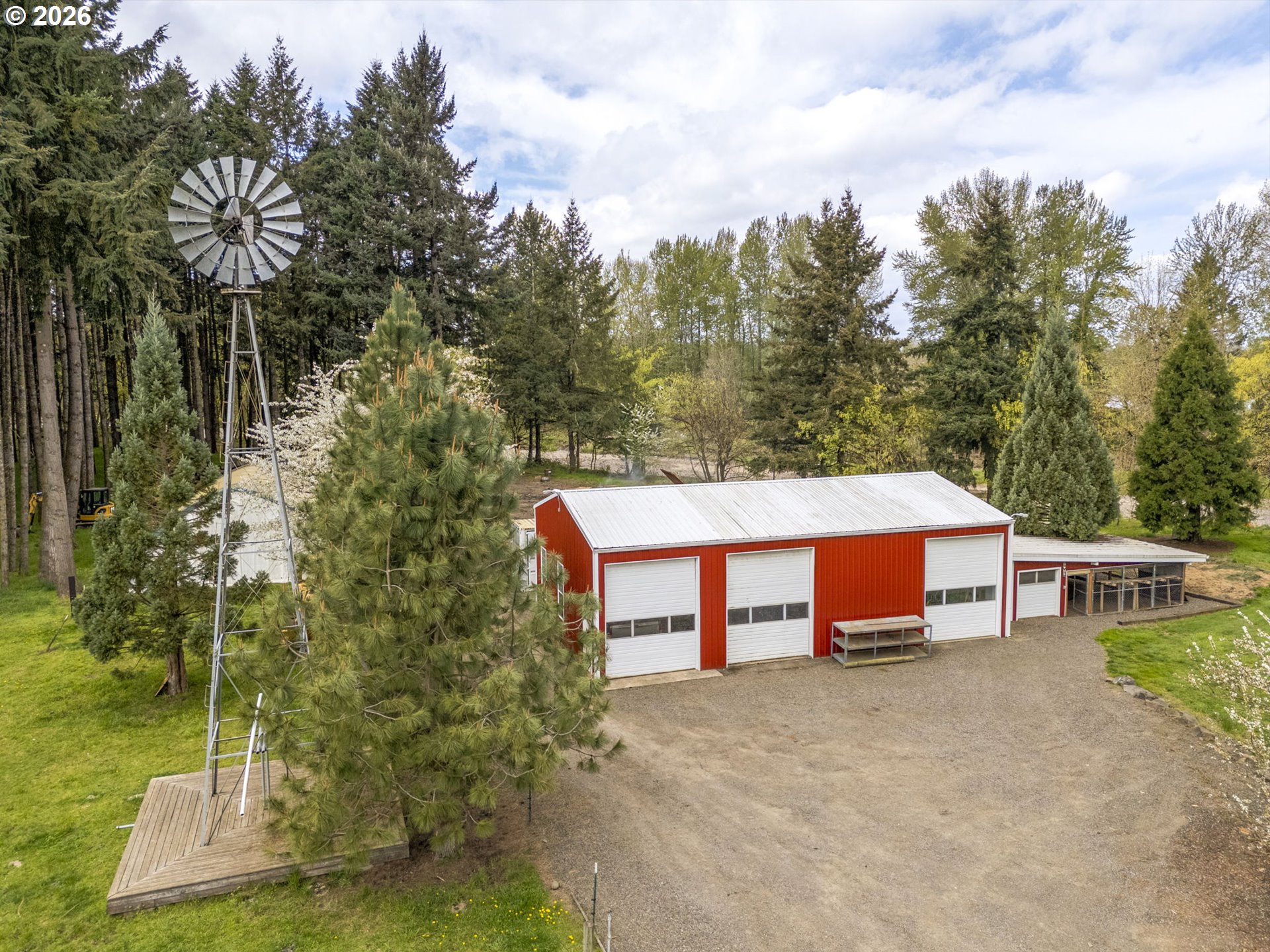 8121 South Vale Garden Road Canby, OR 97013 - Photo 40 of 48 a view of a house with pool and a yard