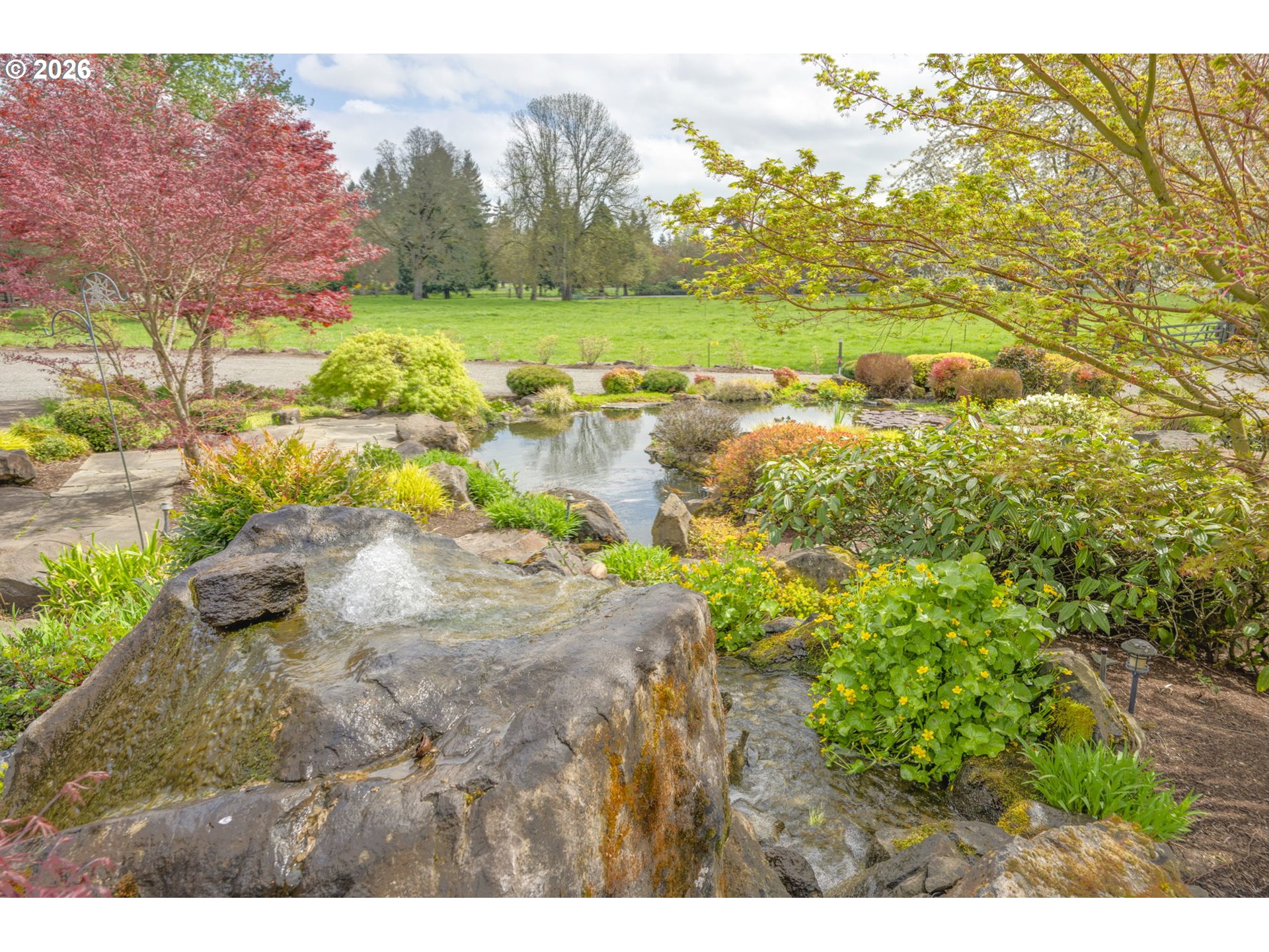 8121 South Vale Garden Road Canby, OR 97013 - Photo 5 of 48 a view of an outdoor space and a yard