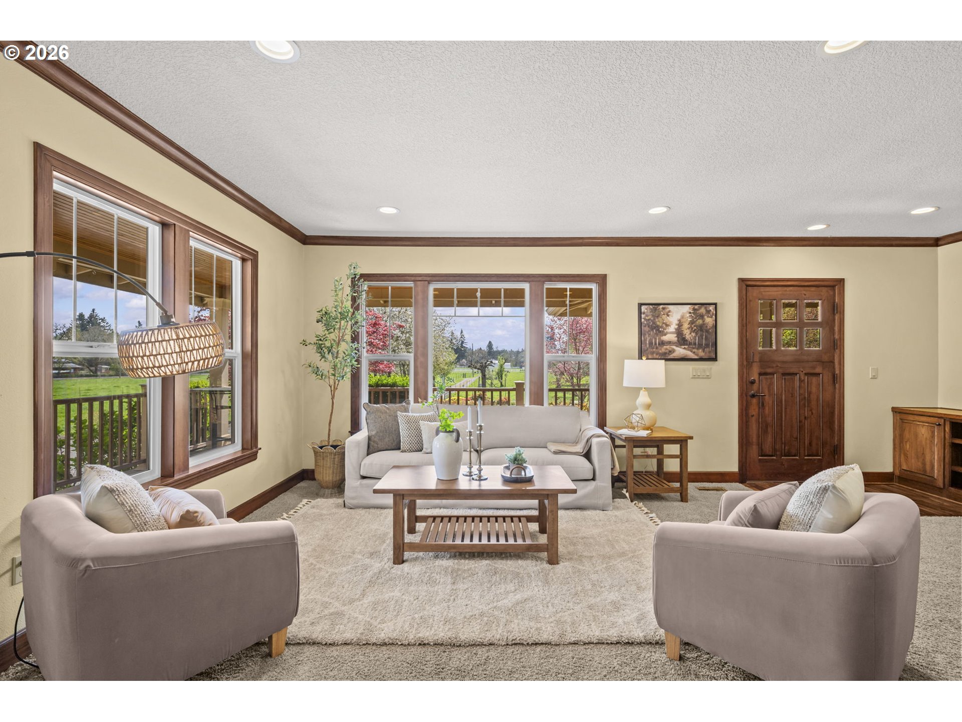8121 South Vale Garden Road Canby, OR 97013 - Photo 8 of 48 a living room with furniture and a large window