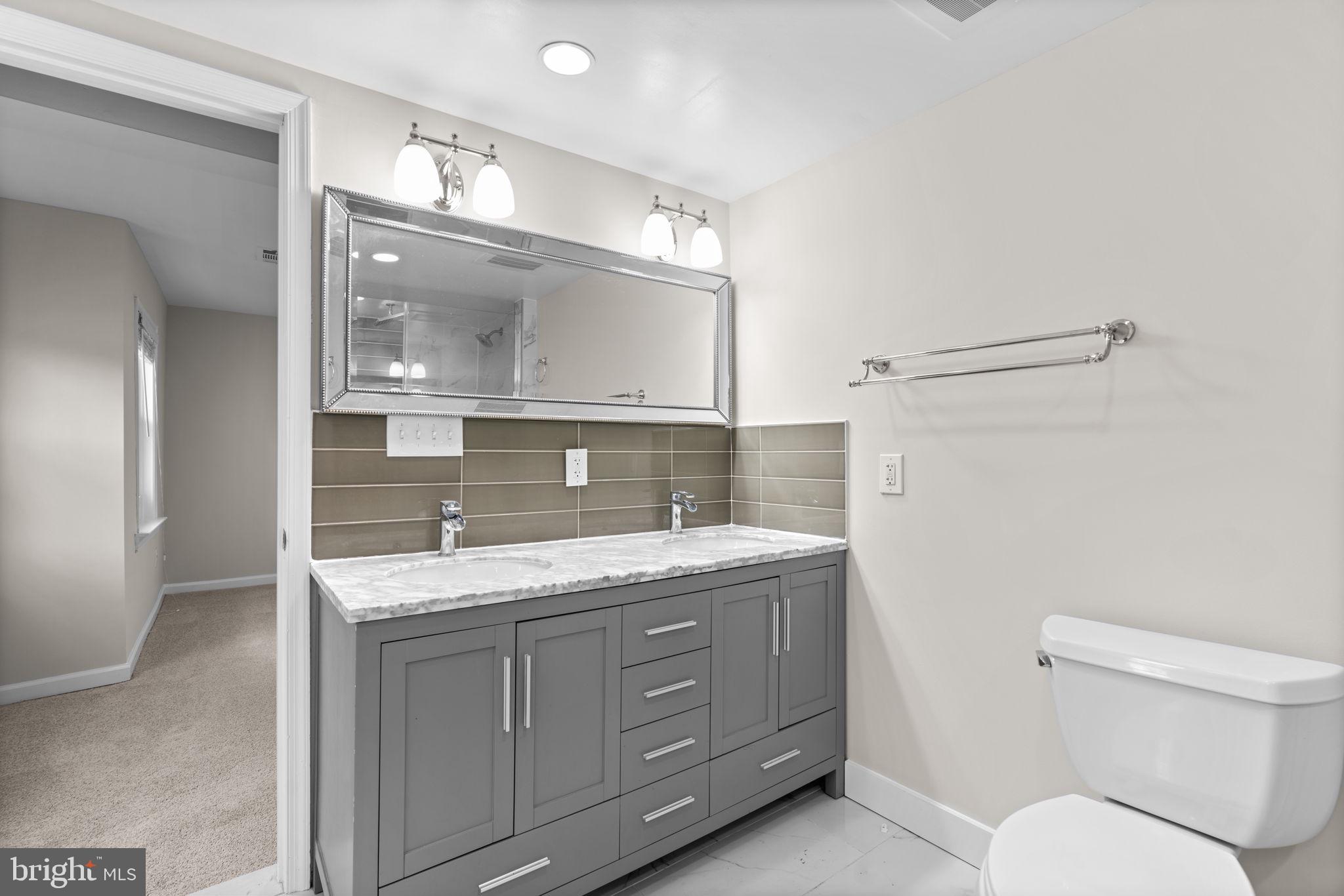 8483 Frederick Road Ellicott City, MD 21043 - Photo 23 of 45 Upper level; primary bathroom.