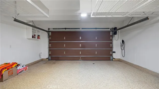a view of room with stairs and a ceiling fan