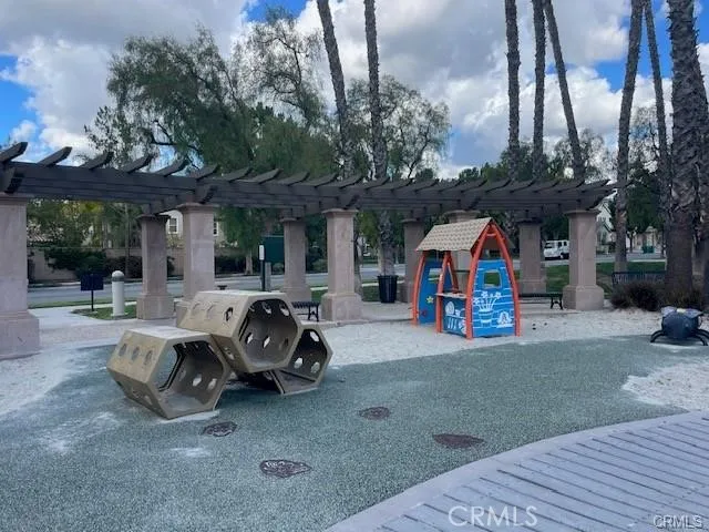 a view of a balcony with wooden floor