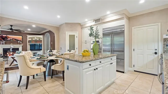 a view of a kitchen counter space and living room