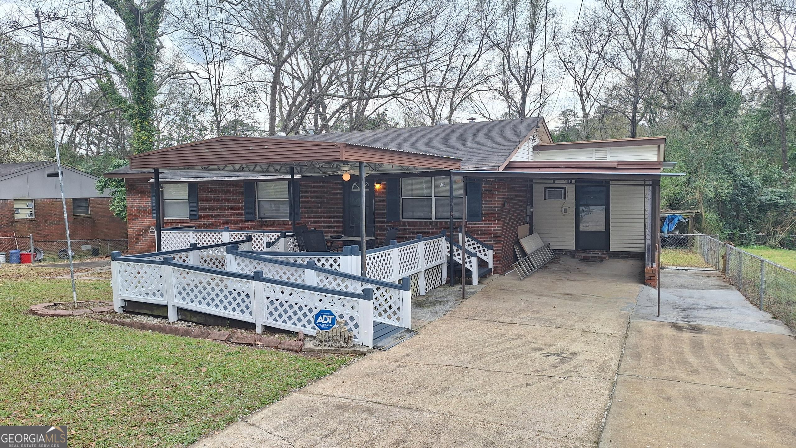 4962 Bonnybrook Way Columbus, GA 31907 - Photo 1 of 1 a view of a house with a yard and furniture