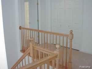 4712 Summer Ridge Drive Howell, MI 48843 - Photo 4 of 4 UPSTAIR PHOTO SIMILAR BUT WITH HALF WALL RATHER THAN SPINDLES