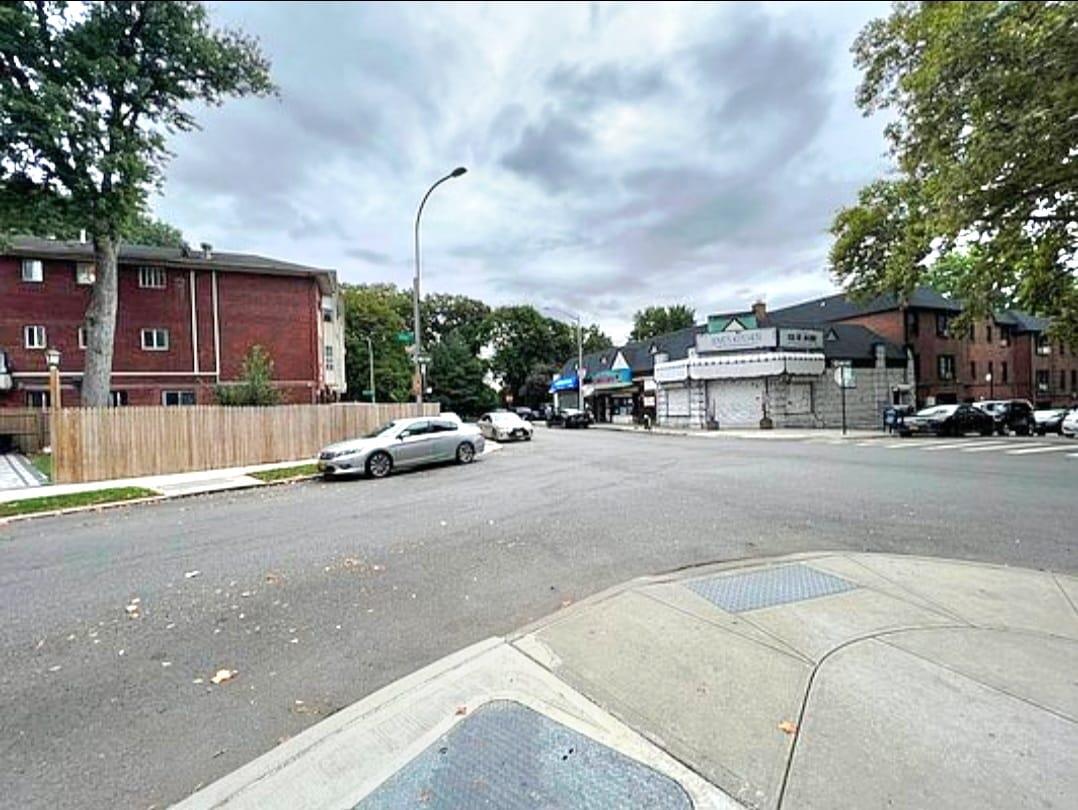 83-64 Talbot Street, Unit 4B Queens, NY 11415 - Photo 9 of 16 a car parked on the side of the street