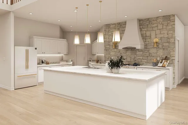 a bathroom with a sink double vanity and a mirror