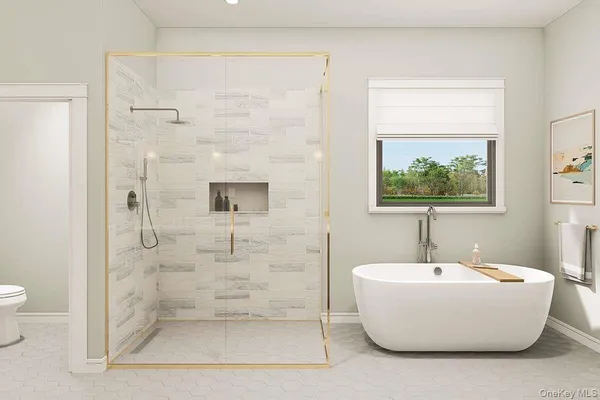 a bathroom with a white tub shower and sink