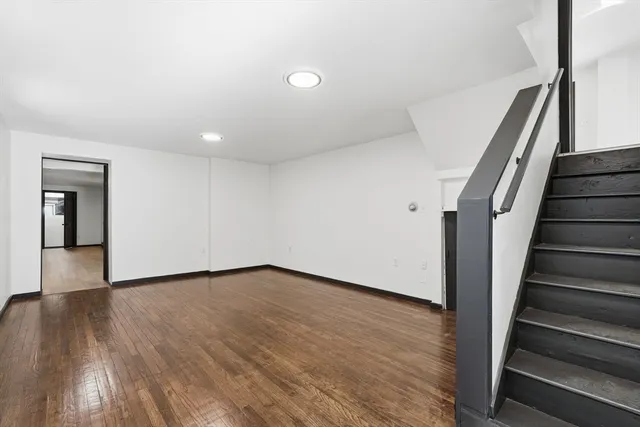 an empty room with closet area