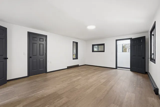 a bathroom with a shower and toilet