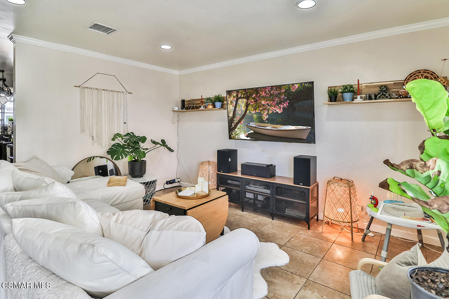 1776 Cochran Street Simi Valley, CA 93065 - Photo 12 of 43 a living room with furniture and a flat screen tv