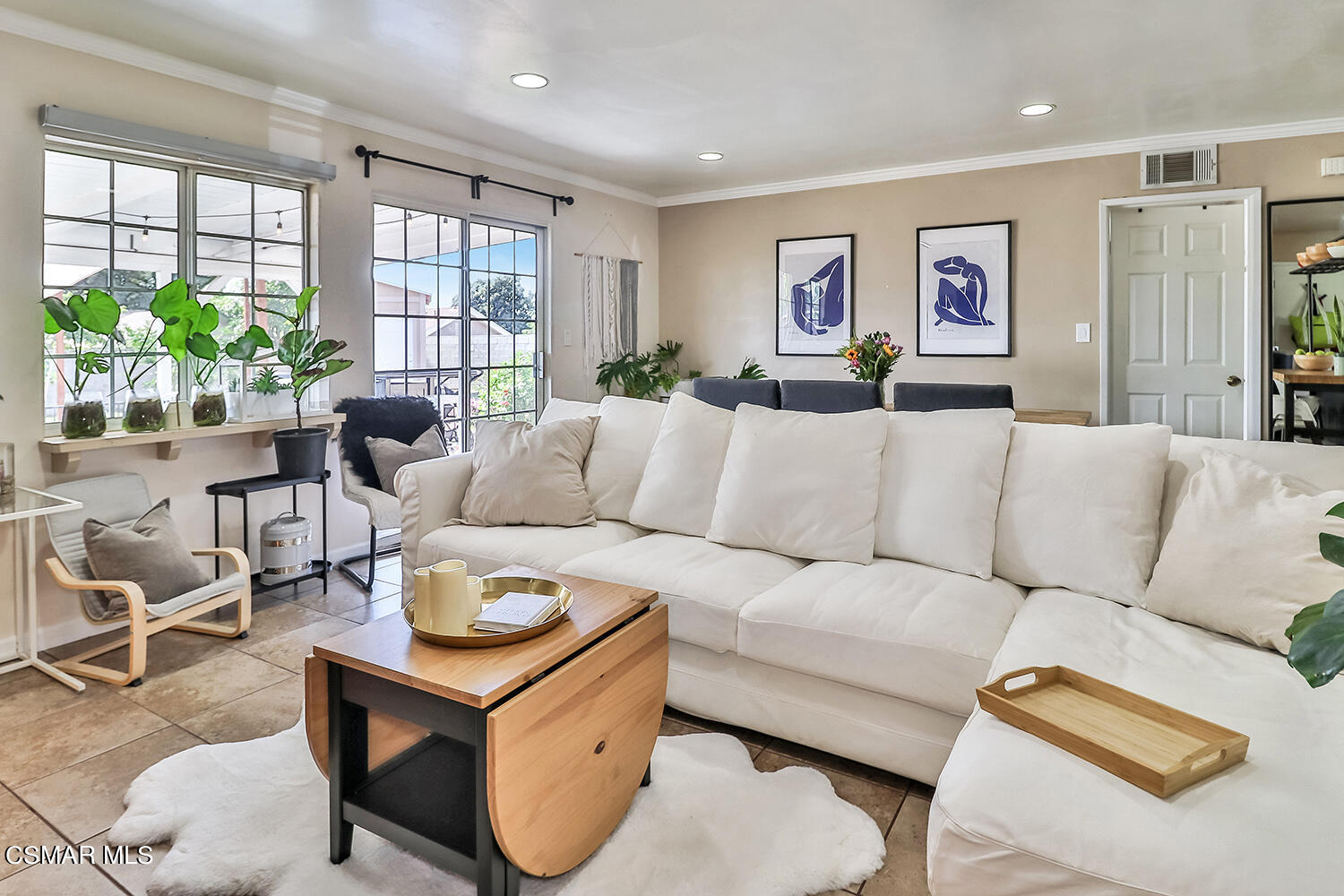 1776 Cochran Street Simi Valley, CA 93065 - Photo 14 of 43 a living room with furniture and a large window