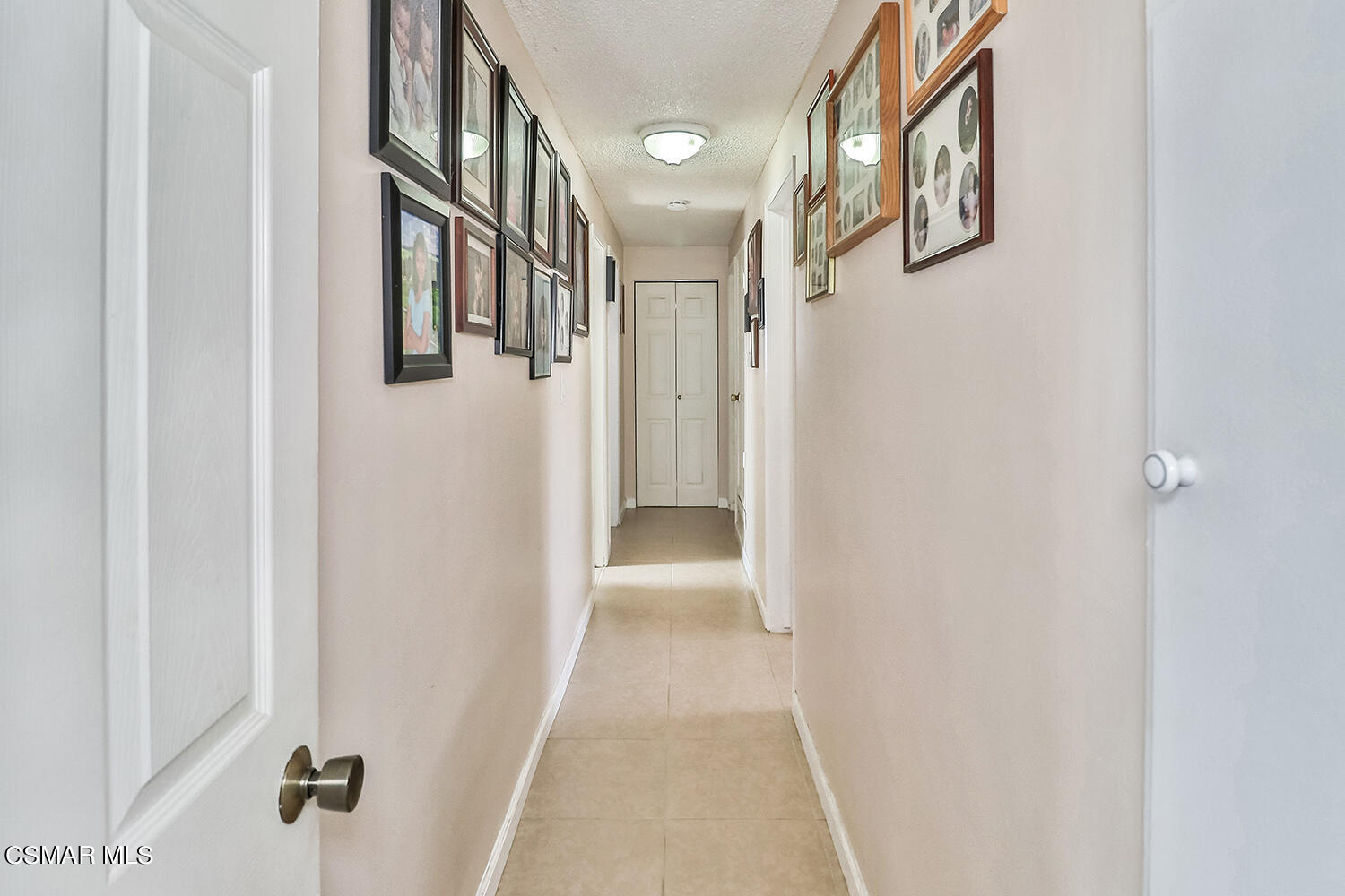 1776 Cochran Street Simi Valley, CA 93065 - Photo 15 of 43 a view of a hallway with wooden floor